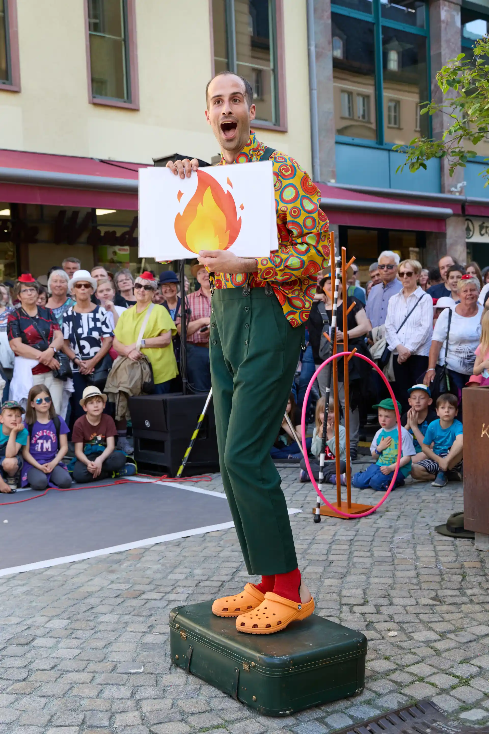 Street artist interacting with audience